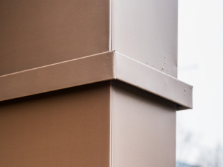 <h1>Gevelbekleding Gepatineerd zink</h1>