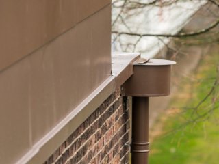 <h1>Gevelbekleding Gepatineerd zink</h1>