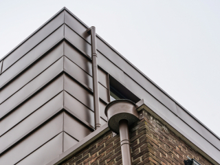 <h1>Gevelbekleding Gepatineerd zink</h1>